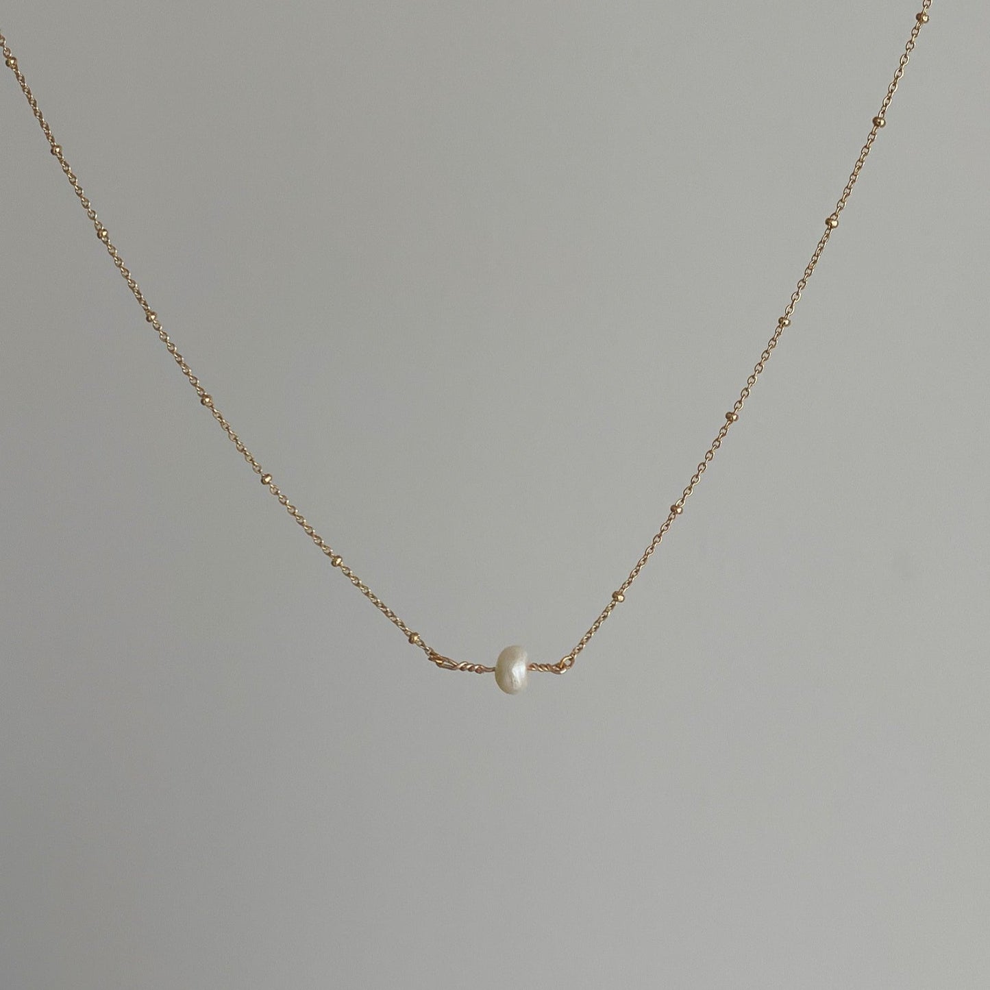 Collier ras du cou de perles