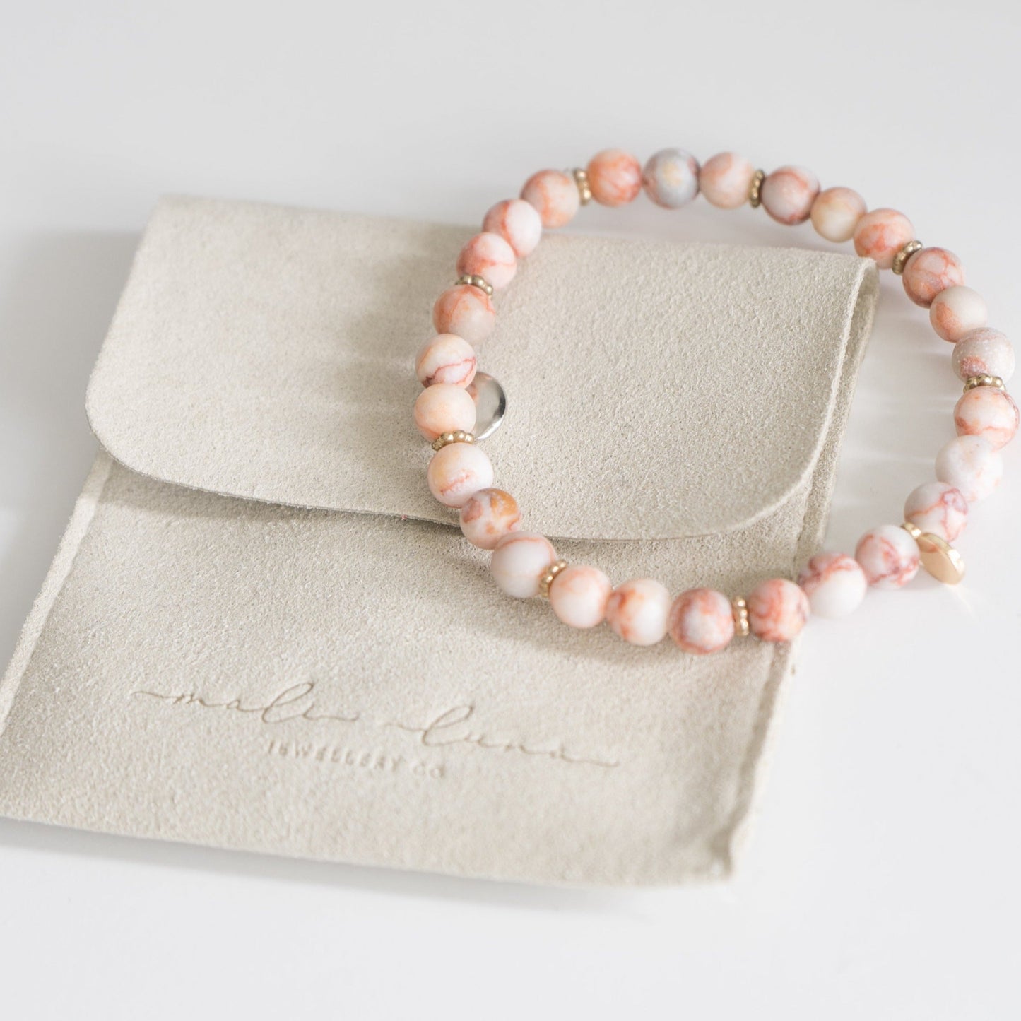 Bracelet en perles de jaspe zébré rose