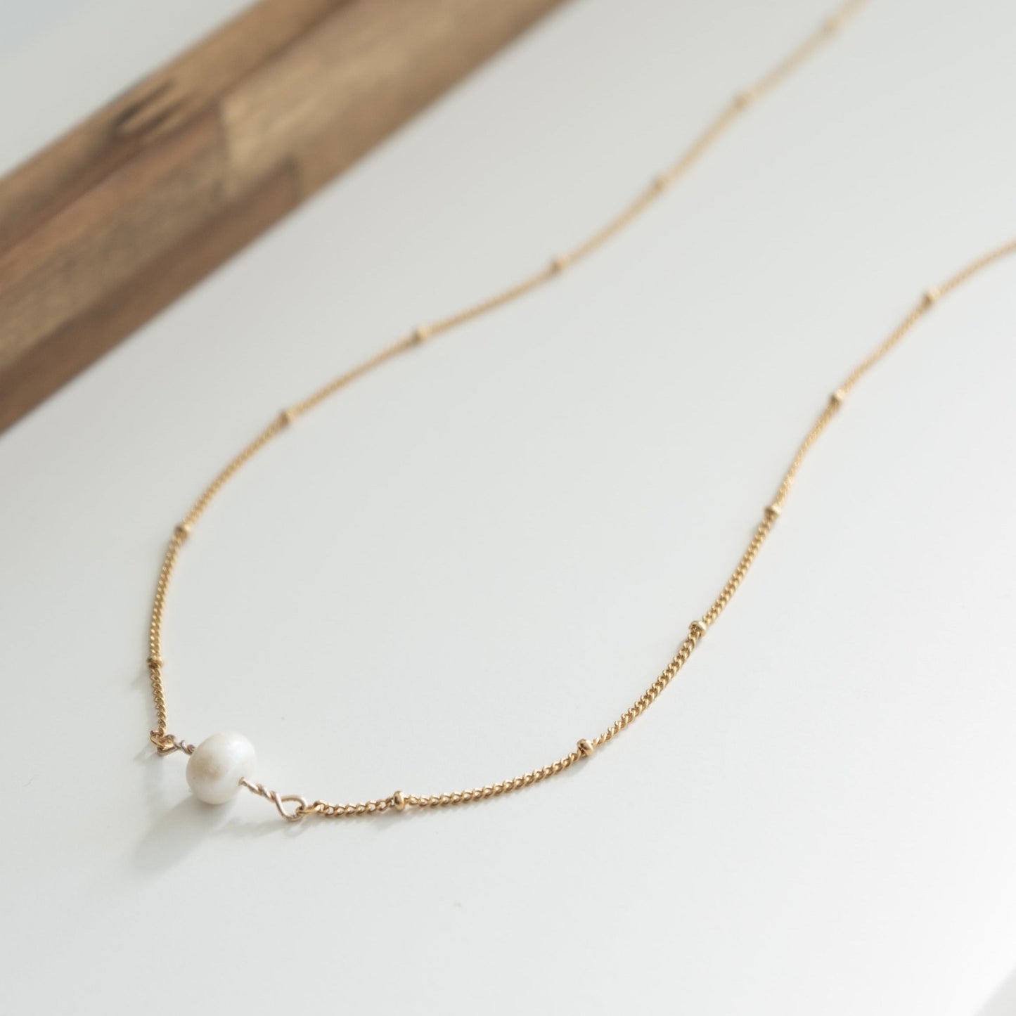 Collier ras du cou de perles